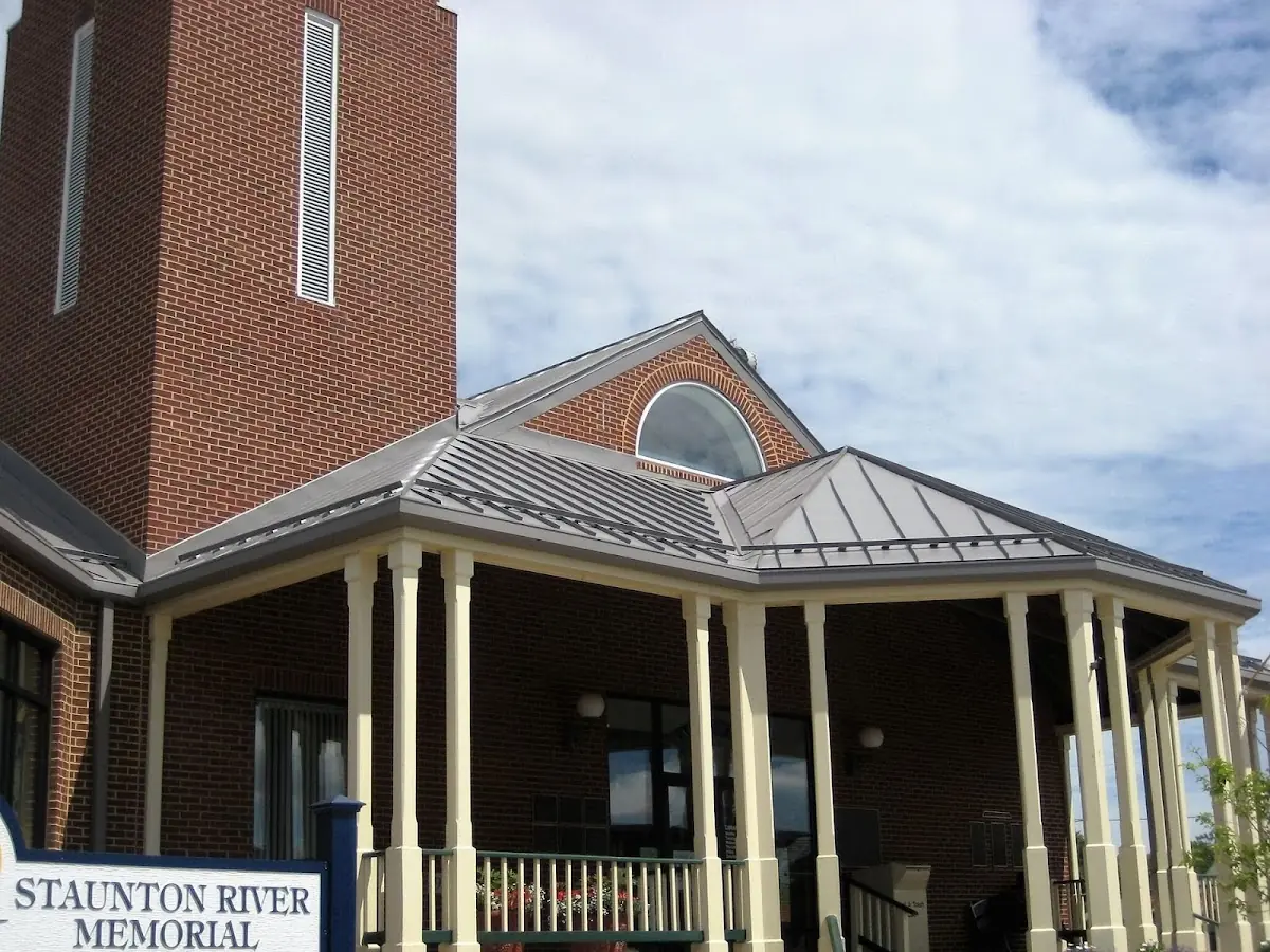 Skilled roofing craftsmen working on a residential roof in Smartville